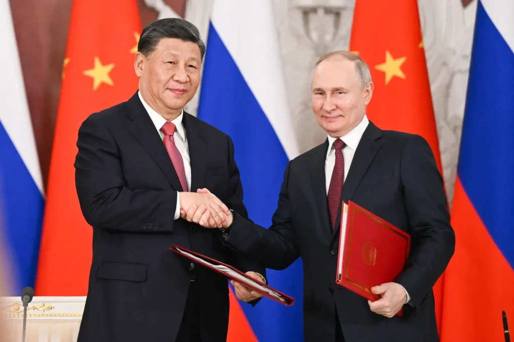 Au-deuxieme-visite-leader-chinois-Xi-Jinping-Moscou-mardi-21-Vladimir-Poutine-souligne-cooperation-illimitee-allie-chinois_0